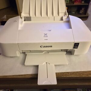 Canon PIXMA iP2820 Inkjet Printer. Printer Weighs 6 Pounds.